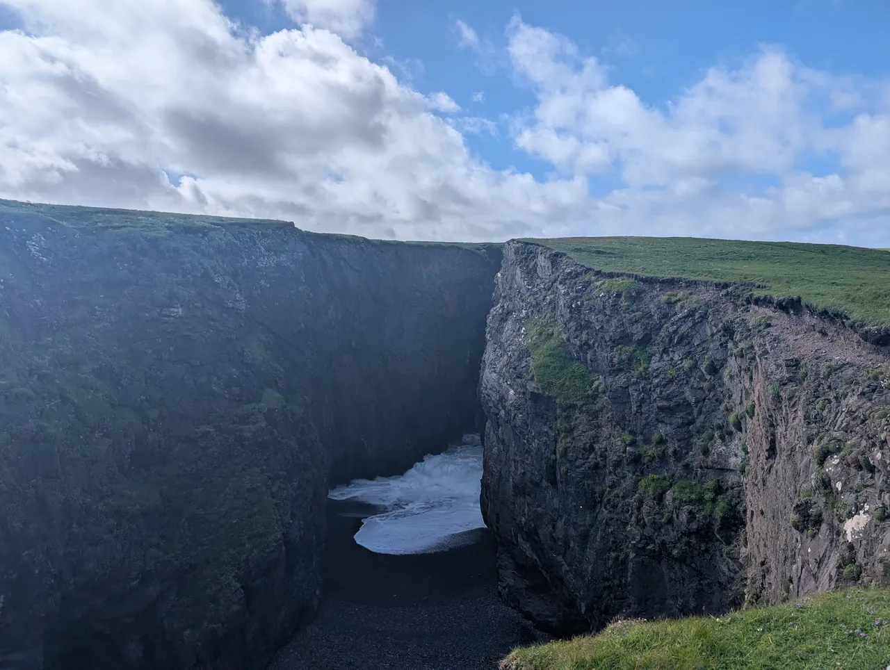 The water intrudes within the land.