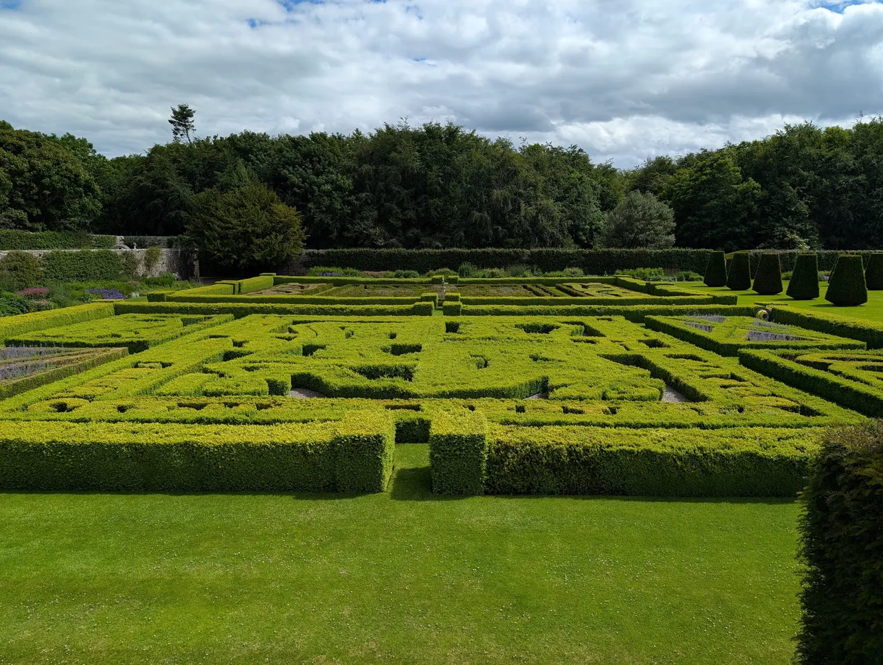 Topiary, not tall enough to get lost within.
