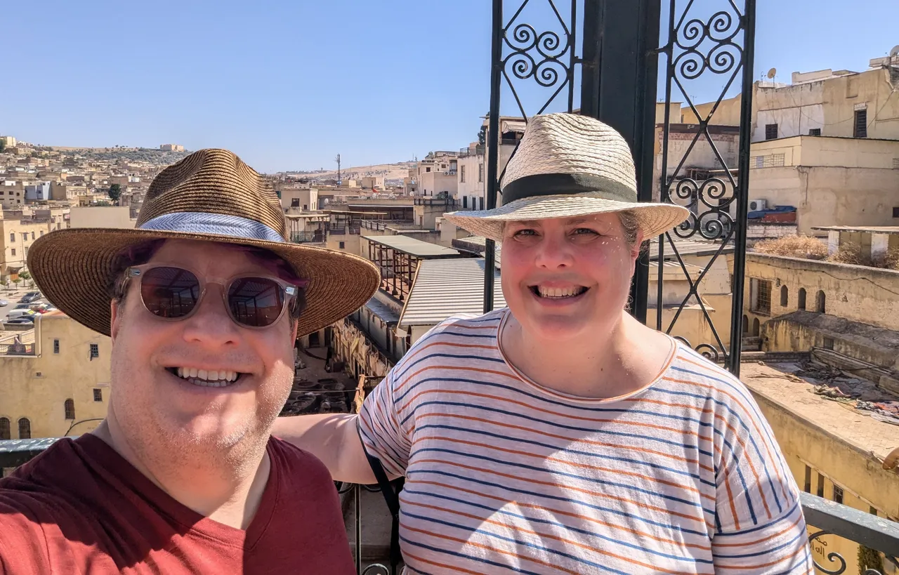 E & C atop the tannery roof, with the Fez Medina in the background