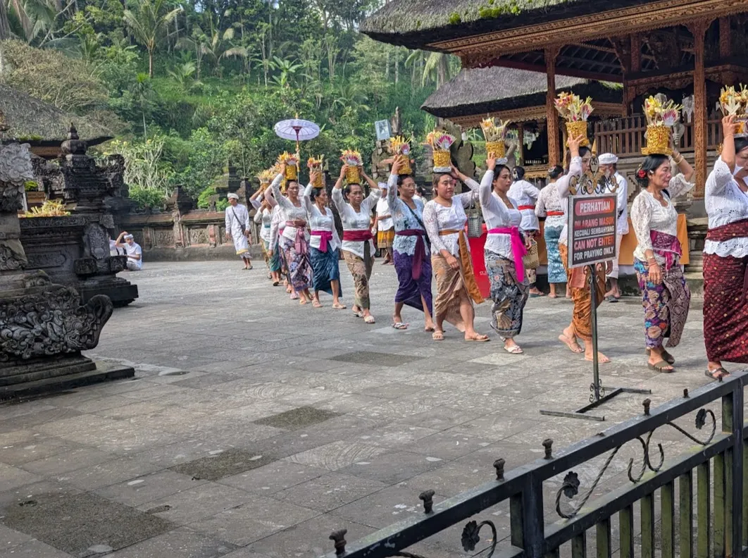 A procession leaving the central courtyard of the temple.