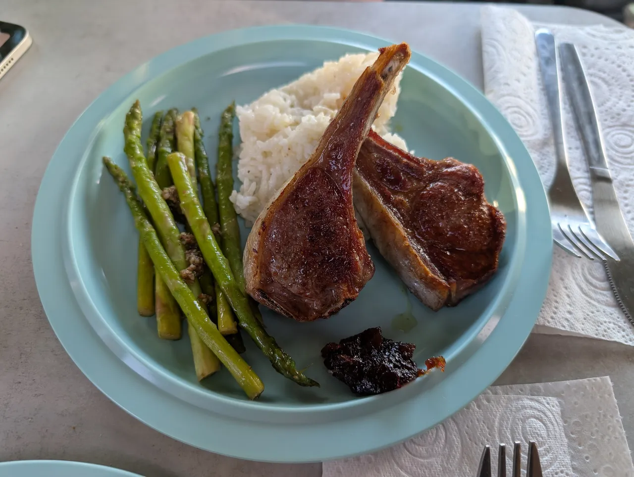 Scotch Lamb, Asparagus, Butter Rice, and Caramelized Onion Chutney. The chutney was from a jar, but I made the rest.