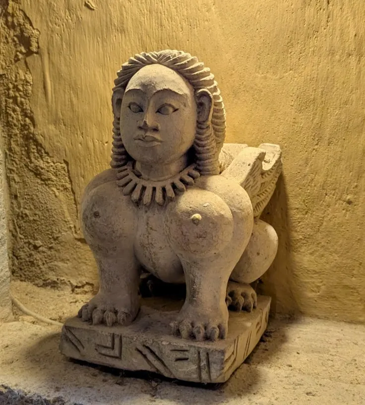 “Okay boss, I carved that sphinx just like you asked.” “A realistic lady sphinx?” “Yep, I put in the shoulder boobs and everything.” “Great.”