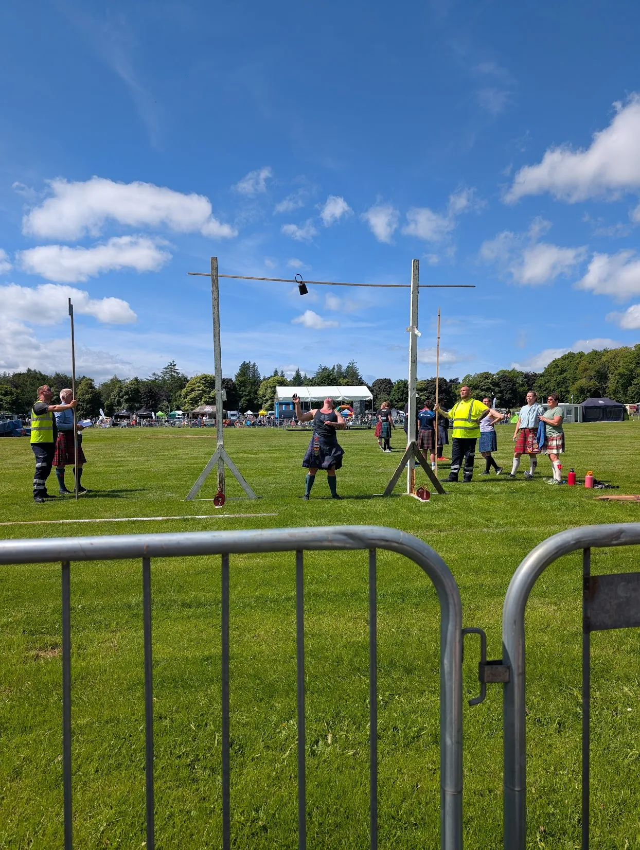 This is the Weight for Height competition. It’s like high jump where they keep raising the bar, except you’re tossing a weight straight up. Happy to say: it didn’t bonk anyone. Sad to say: my camera was kind of a jinx, where every time I tried to get a shot, the thrower missed the bar, so I stopped.
